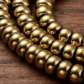 Hematite — Golden Rondelles 6x3.5mm | Strand ~40 cm