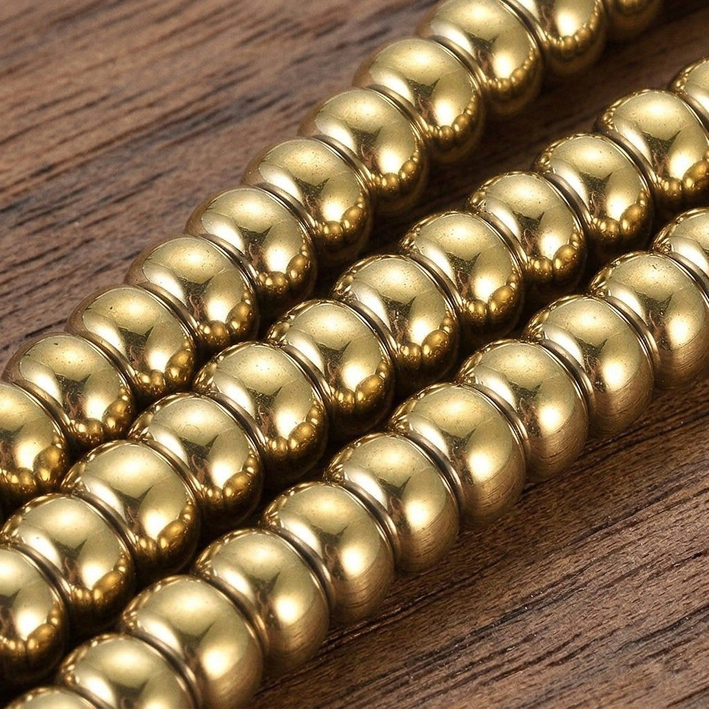 Hematite — Golden Rondelles 6x3.5mm | Strand ~40 cm