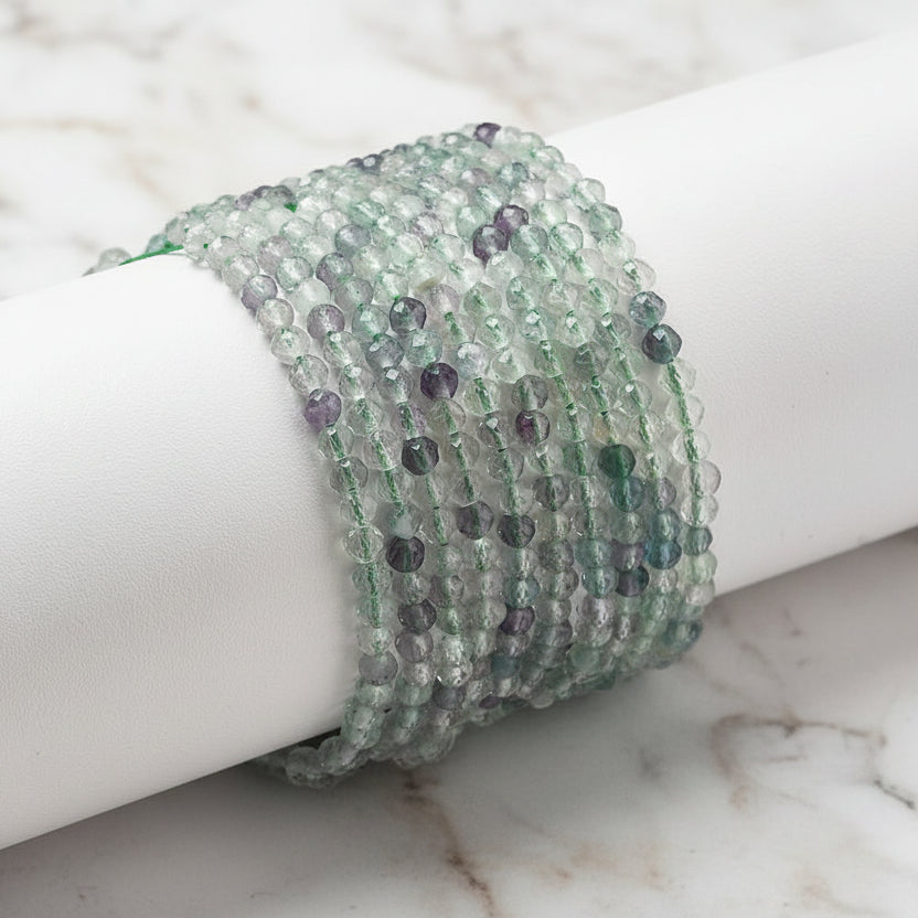 Fluorite - faceted beads 2 - 3 - 4 mm. - Strand 39 cm.