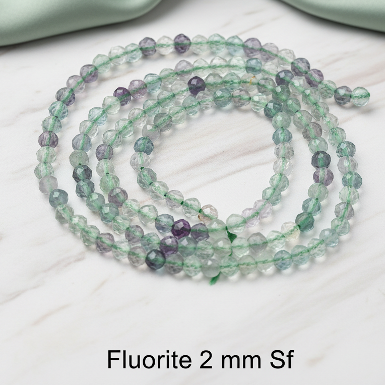 Fluorite - faceted beads 2 - 3 - 4 mm. - Strand 39 cm.