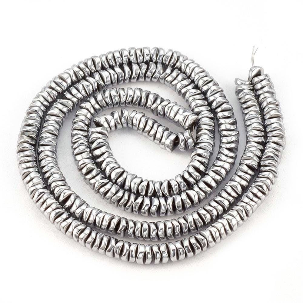 Hematite — Wavy Rondelles 4x1.5mm | Gold and Silver | Strand ~40 cm