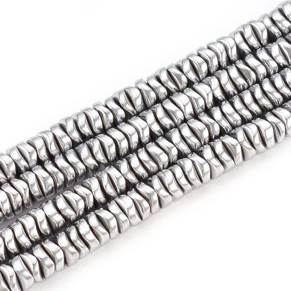 Hematite — Wavy Rondelles 4x1.5mm | Gold and Silver | Strand ~40 cm