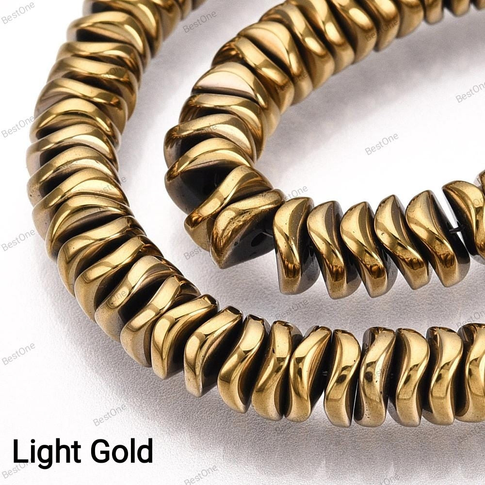 Hematite — Wavy Rondelles 6x2mm | Assorted Colors | Strand ~41 cm
