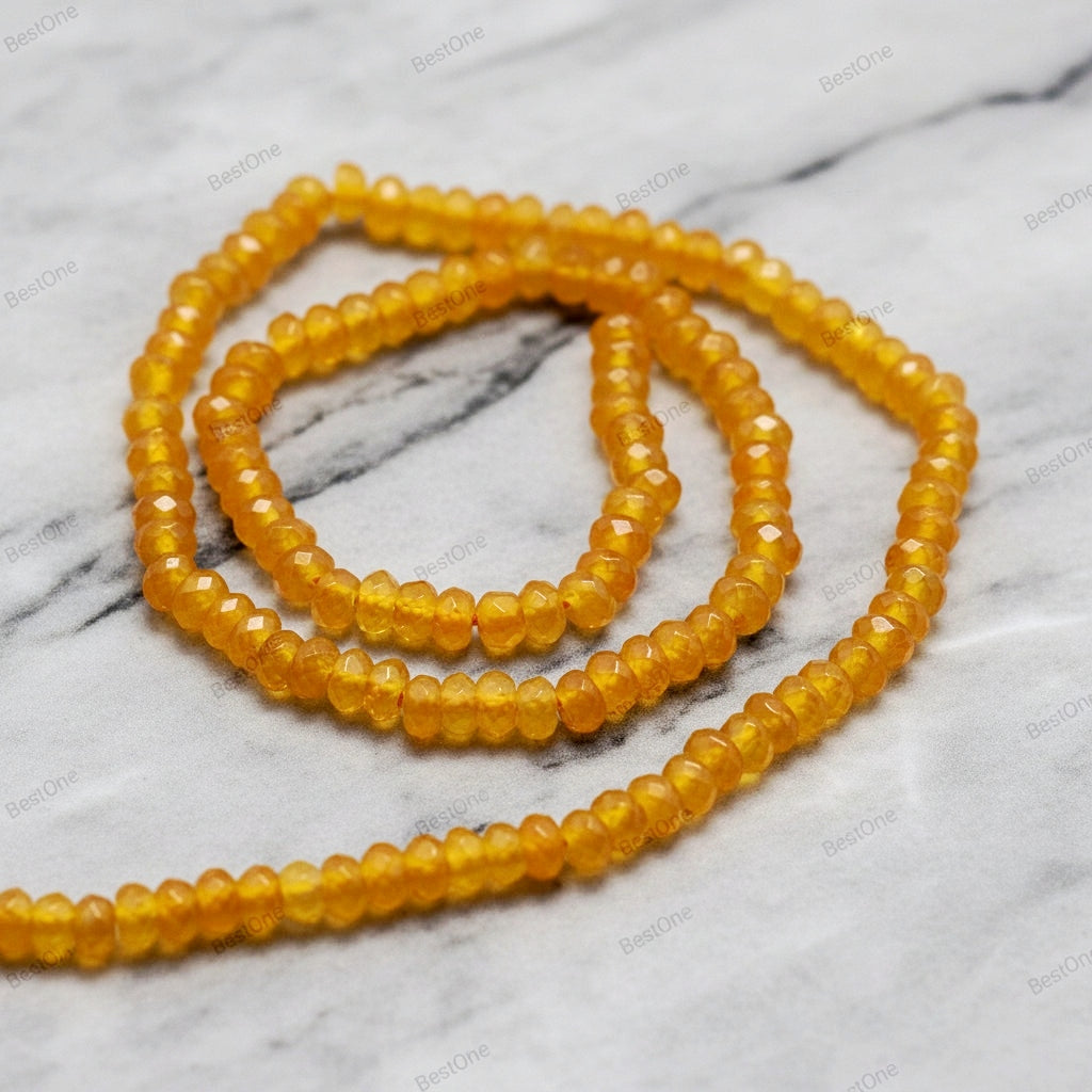 Malaysian Natural Jade — Faceted Rondelles 4x2mm | Goldenrod | Strand ~36 cm